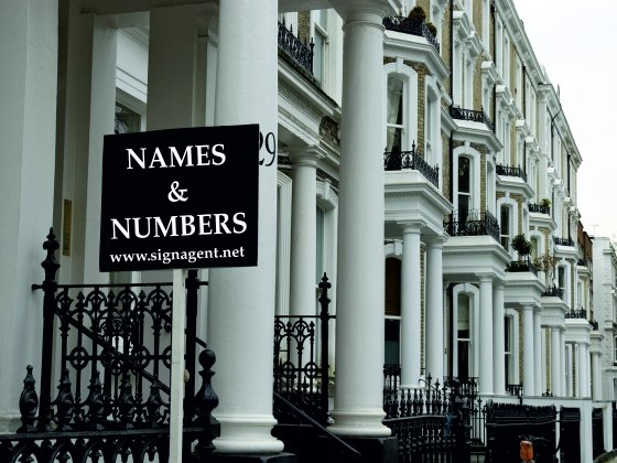 Estate agent board being erected.jpg